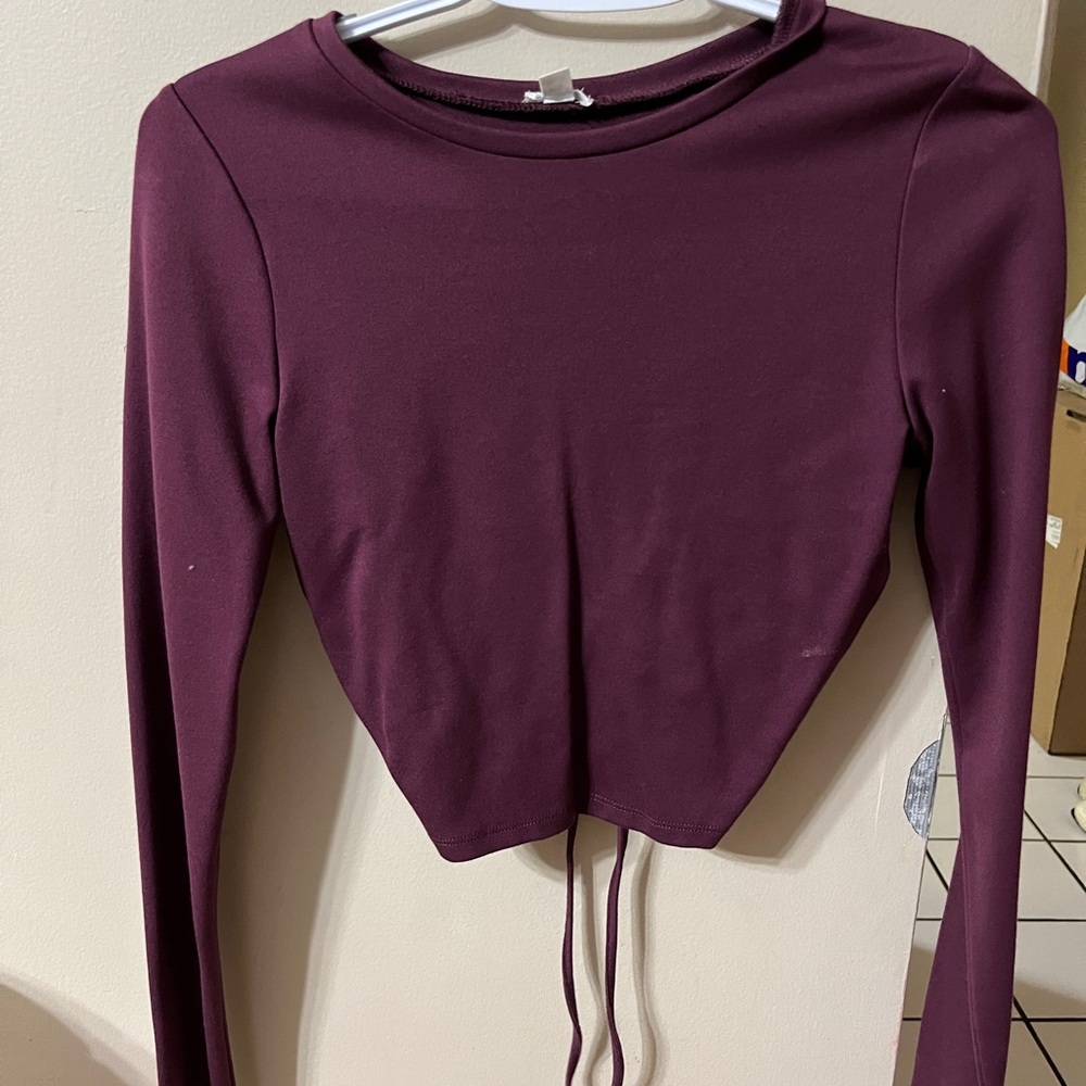 Garage cropped long sleeve with open back detail